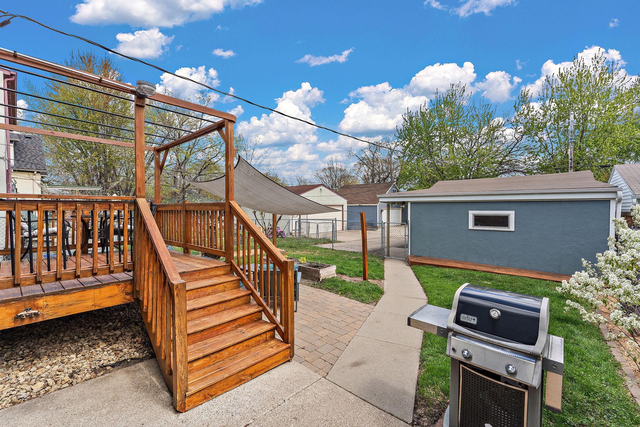 Entering through the south gate into the back yard. Who's ready to grill out?