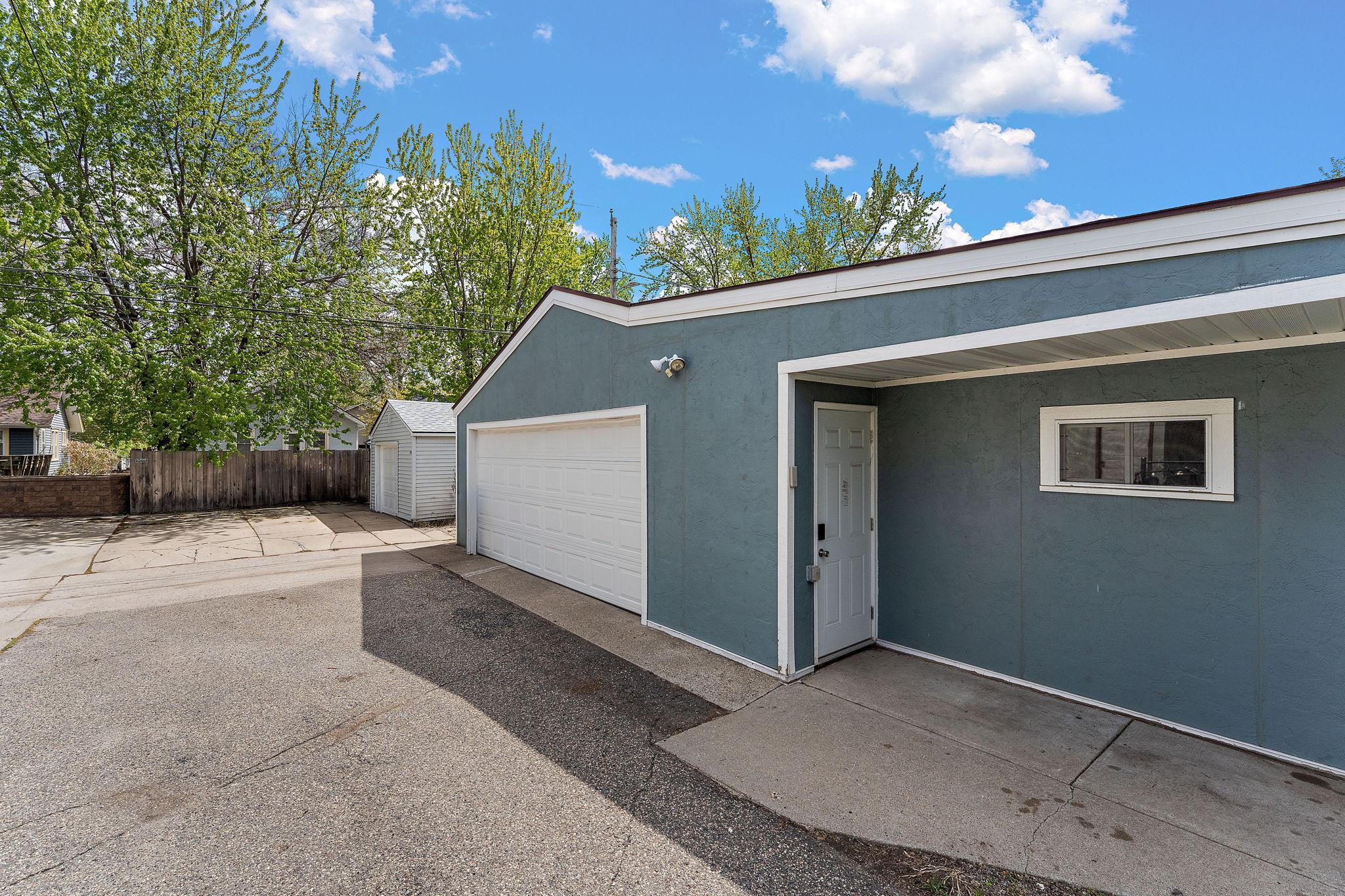 Two-stall garage PLUS an attached, insulated 18' by 12' workshop for the woodworker in you!