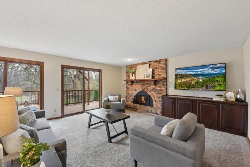 Gas fireplace, walks right out to a huge deck