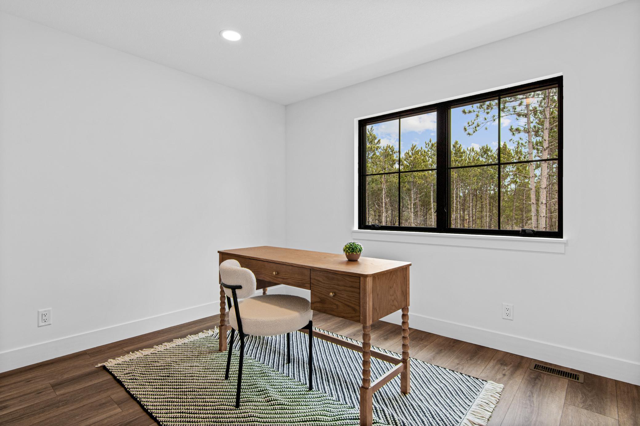 Upper level bedroom 4 is the perfect flex space for guests or a home office