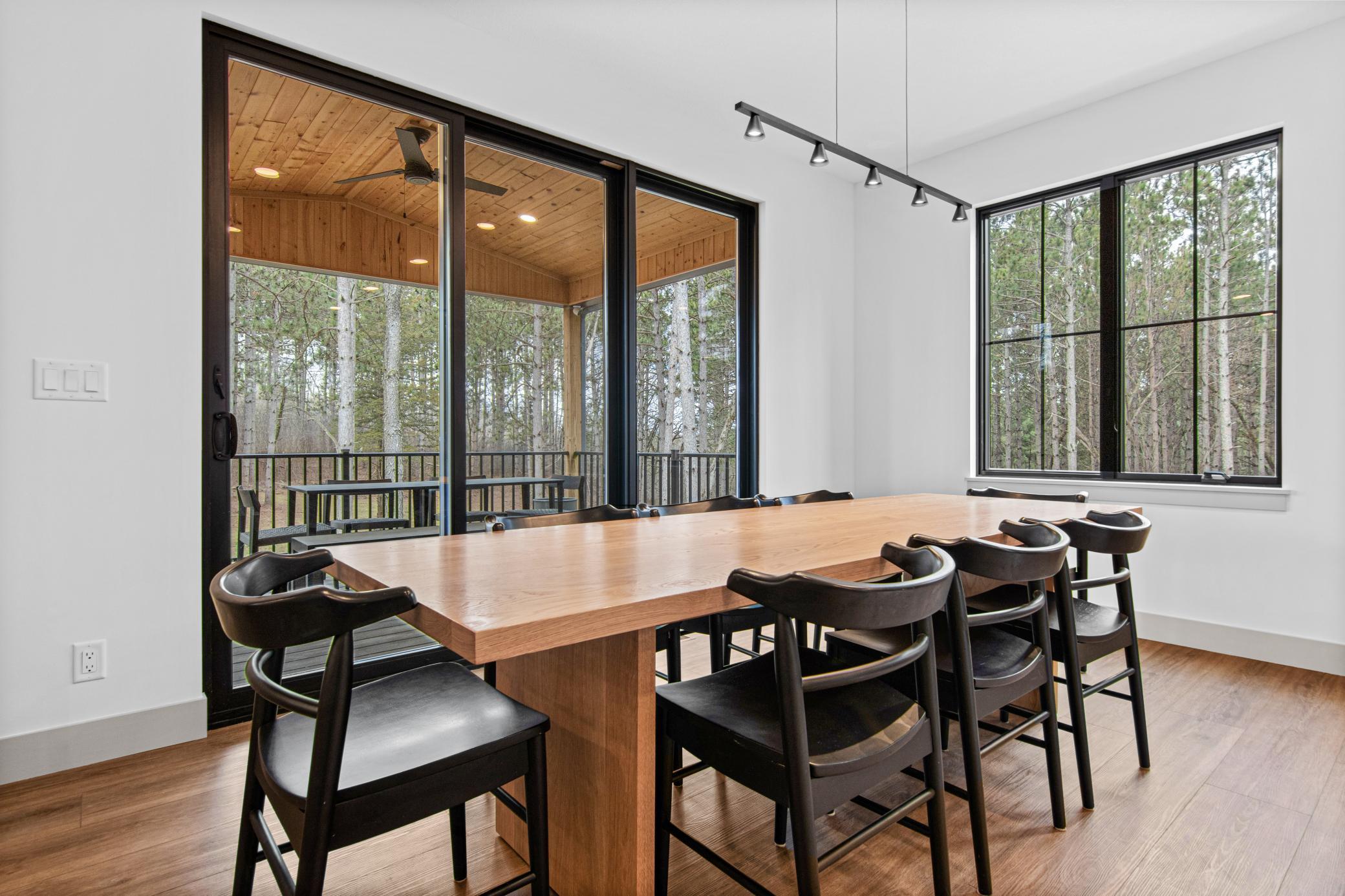 Dining area with easy access to the covered deck for indoor-outdoor living