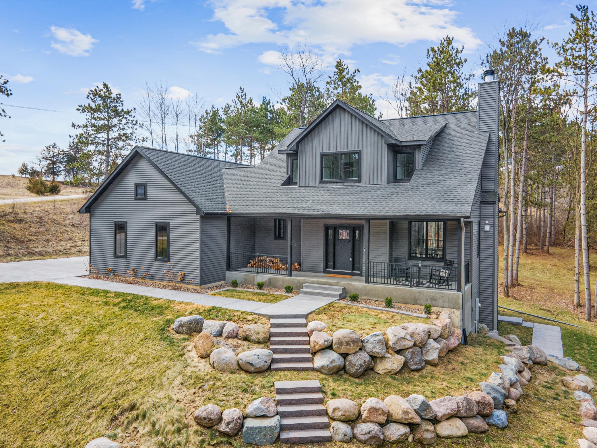 Custom-built River Falls home with a balance of modern design and natural surroundings