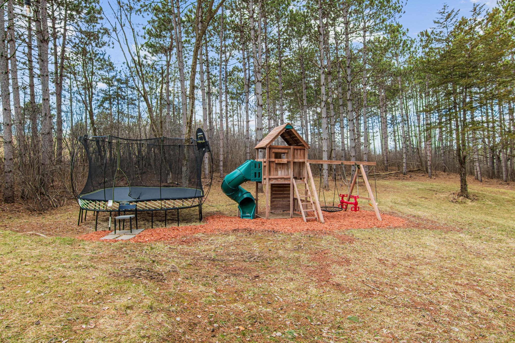 Backyard with open green space, play area, and room to explore