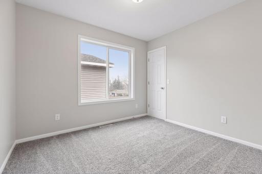 Upper level third bedroom.