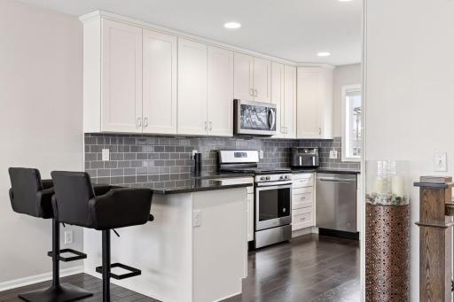 Breakfast bar provides additional seating.