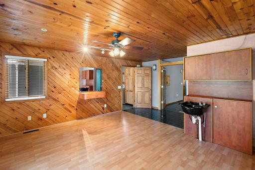 Currently set for an in-home salon, easy conversation to wet bar or remove completely