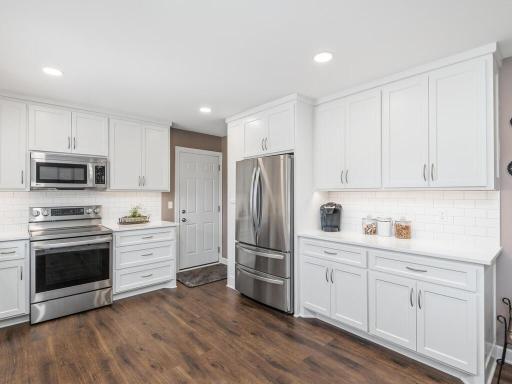 Beautiful floors throughout with stainless steel appliances in kitchen