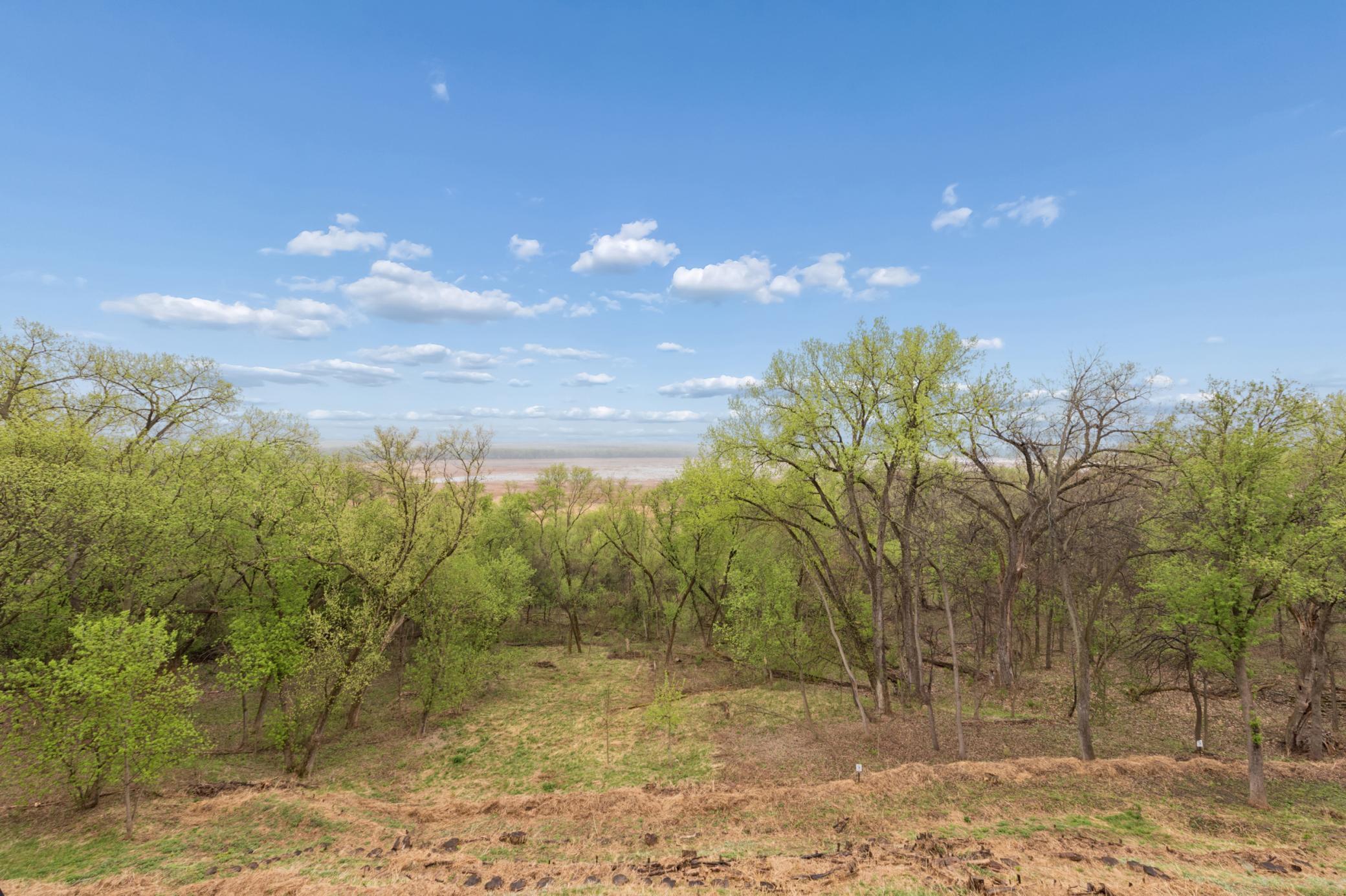 Trade noisy city streets for the peaceful, calming views of a preserved nature canopy.