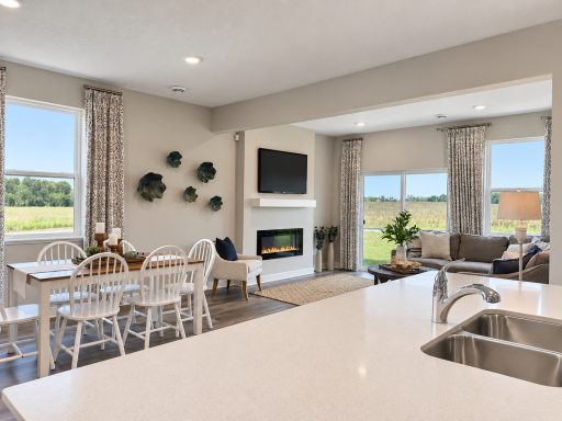 The oversized island overlooks the dining and living areas, keeping everyone connected while entertaining.