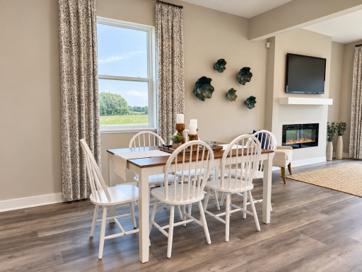 The spacious dining area offers plenty of room for everyday meals and special gatherings.