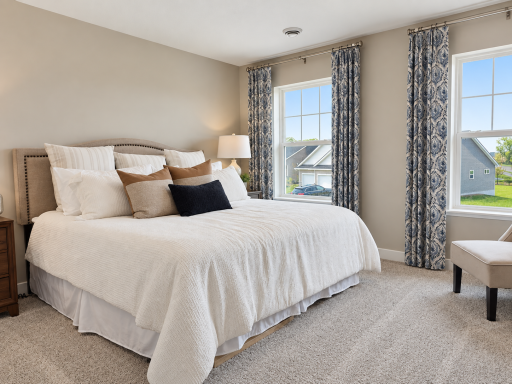Enjoy your own private retreat in the generously sized primary bedroom with his and her closets.