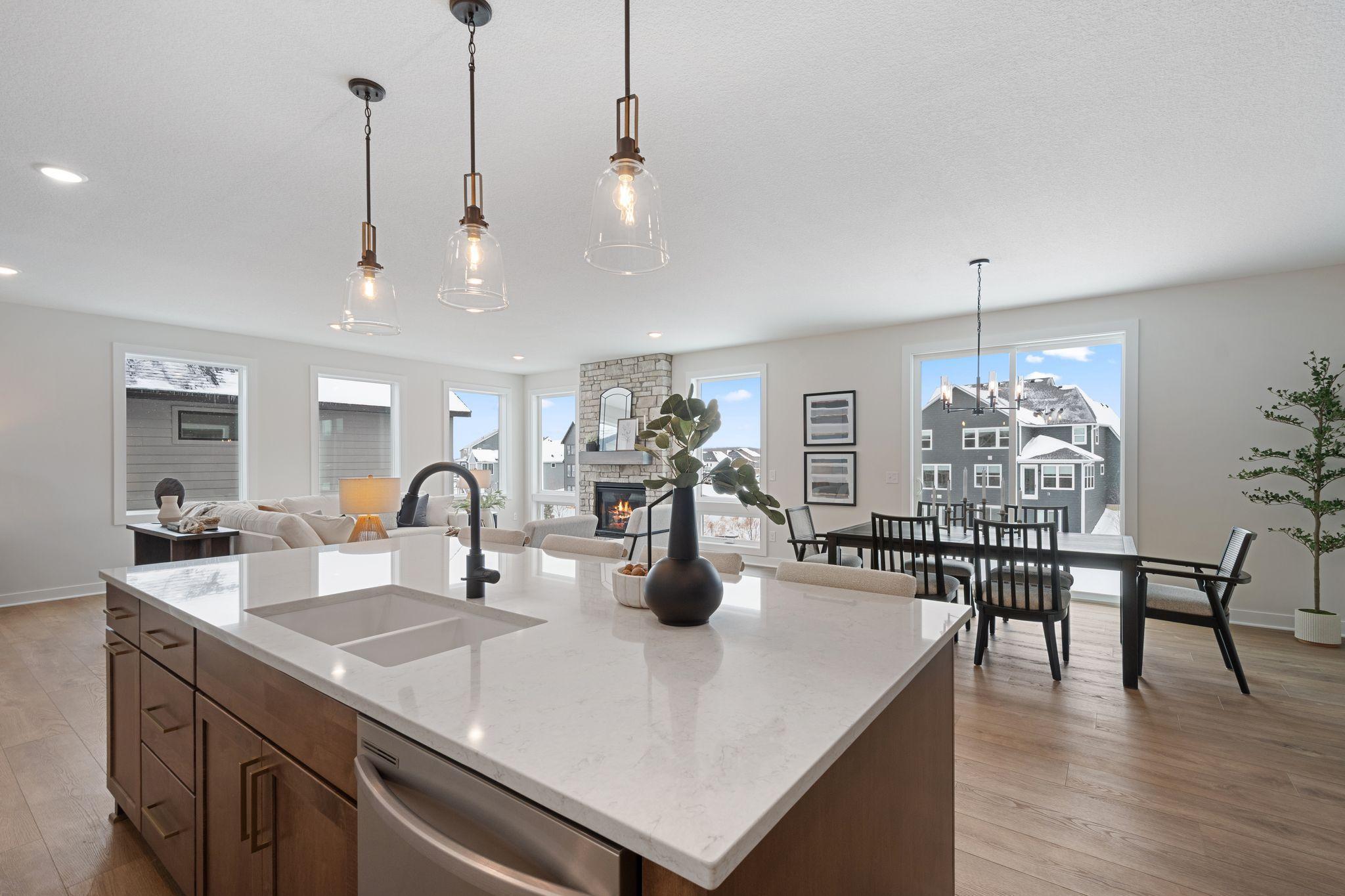 Elite kitchen overlooking living room and dining room