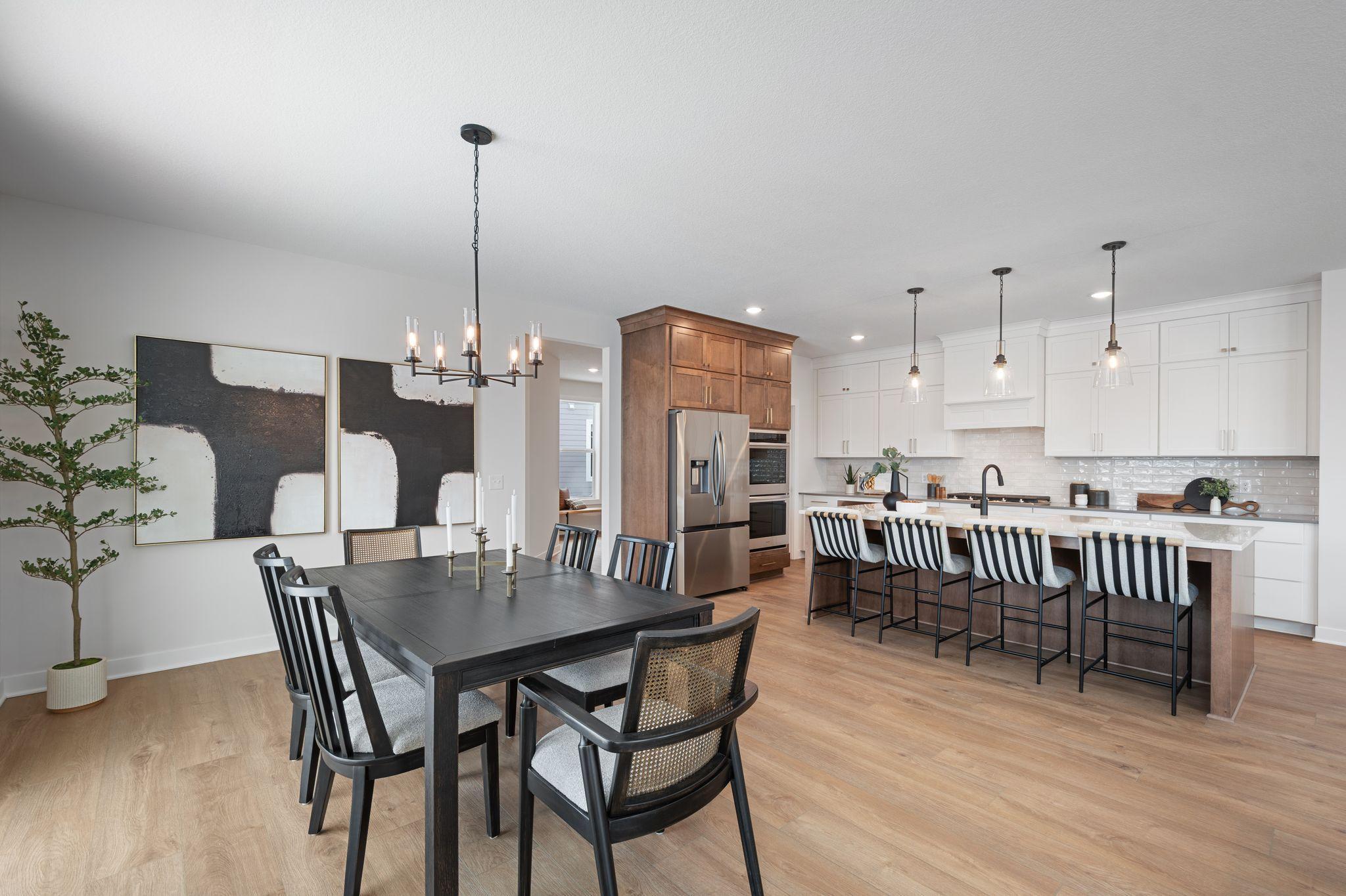 Dining room overlooked by the elite kitchen