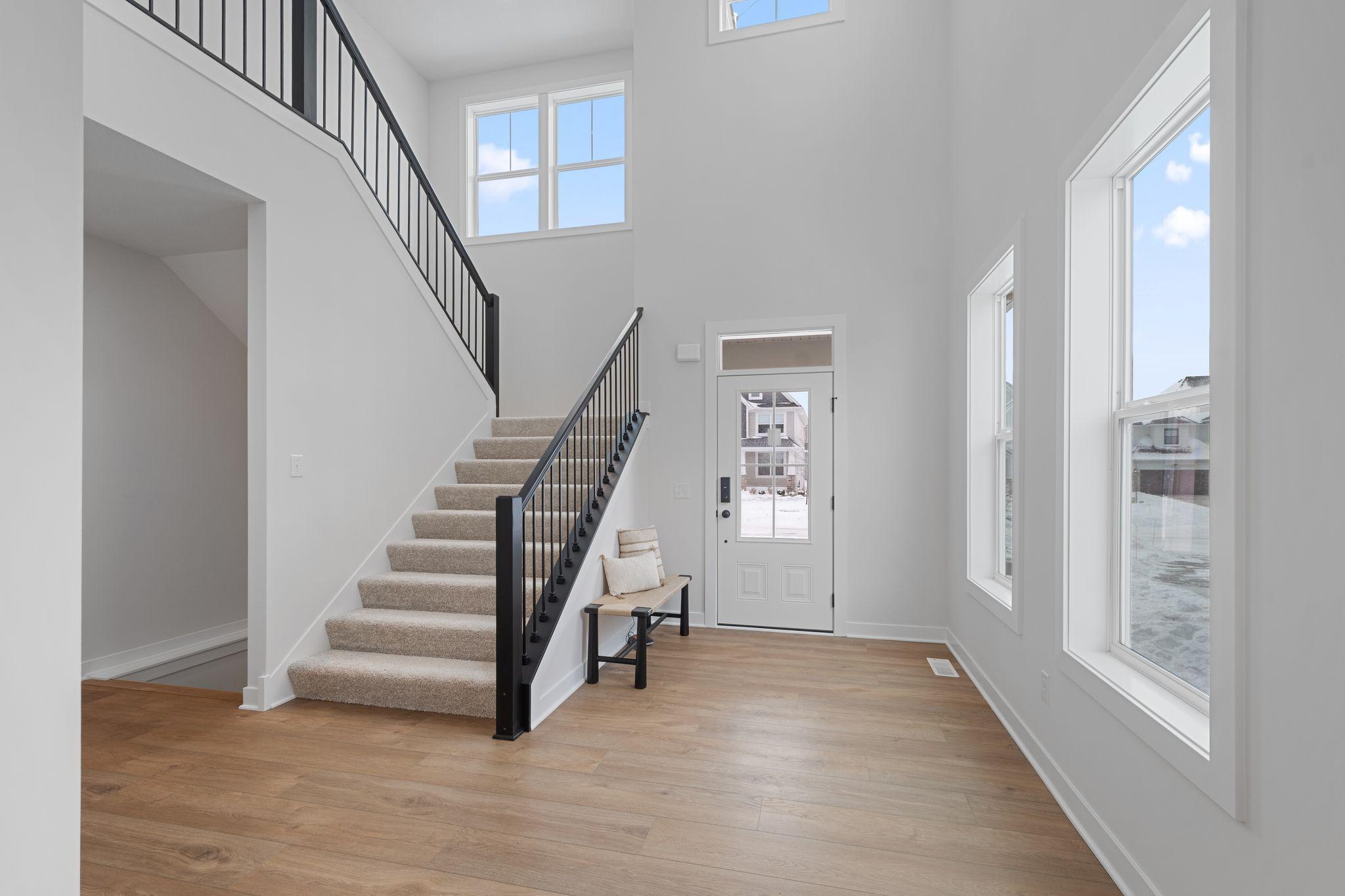 2 story entryway with grand staircase