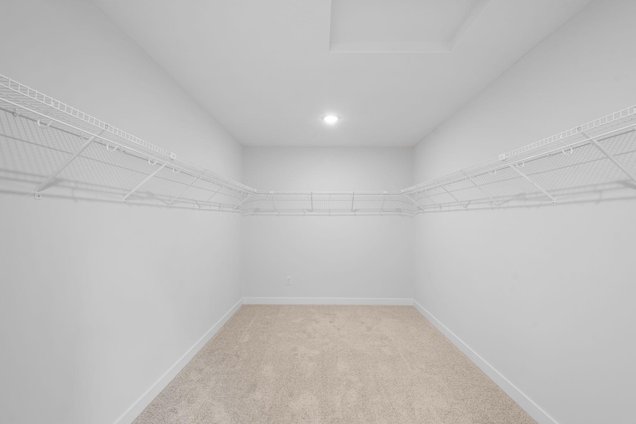 Primary bedroom HUGE walk-in closet