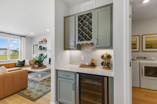 Use this space as a coffee nook, separate cooking prep area, or mini bar! Photo of model home, colors and finishes may vary.