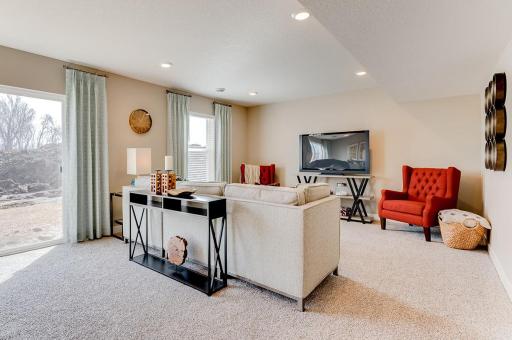 Finished lower level! Photos of model home. Colors and options may vary. Ask Sales Agent for details.