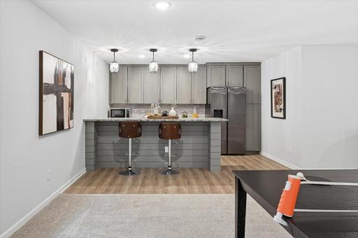 The lower level bar area will be your new favorite gathering spot with friends or family.