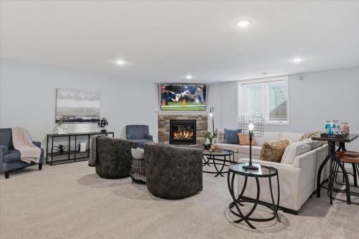 Huge lower level amusement/recreation with 2nd gas fireplace area! Bring out the games and the movies!