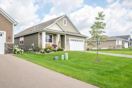 Why wait for new construction when you can move right in and enjoy your summer free of yard work!