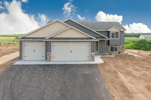 Photos are of a previously completed home with similar design and features. Actual selections, finishes, and materials may vary based on buyer choices and availability.