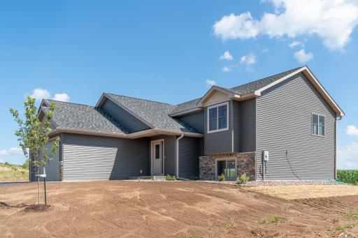 Photos are of a previously completed home with similar design and features. Actual selections, finishes, and materials may vary based on buyer choices and availability.