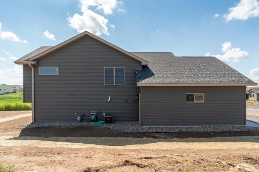 Photos are of a previously completed home with similar design and features. Actual selections, finishes, and materials may vary based on buyer choices and availability.