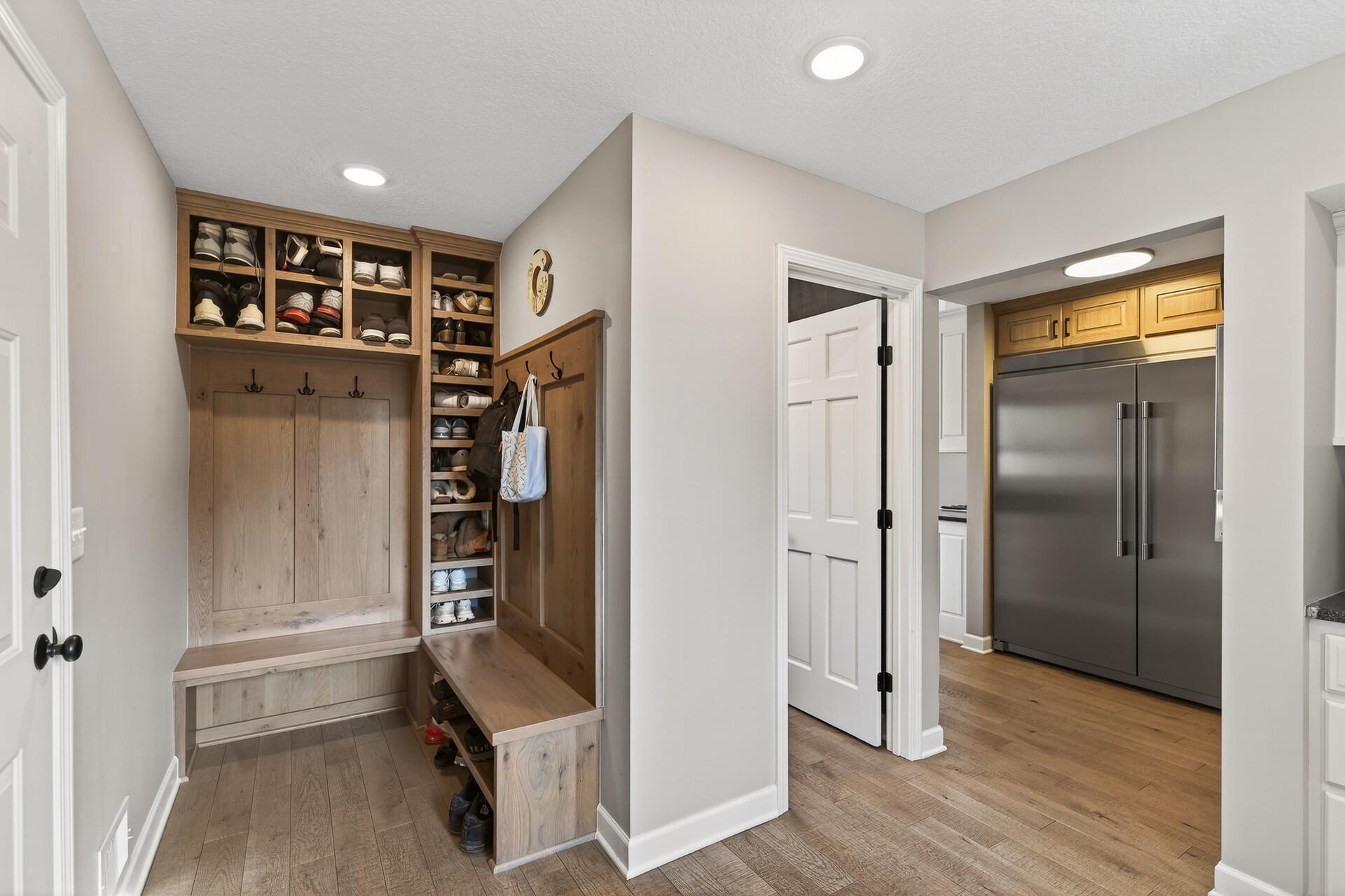 Practical and polished: a dedicated mudroom entry that connects the garage directly to the prep pantry.