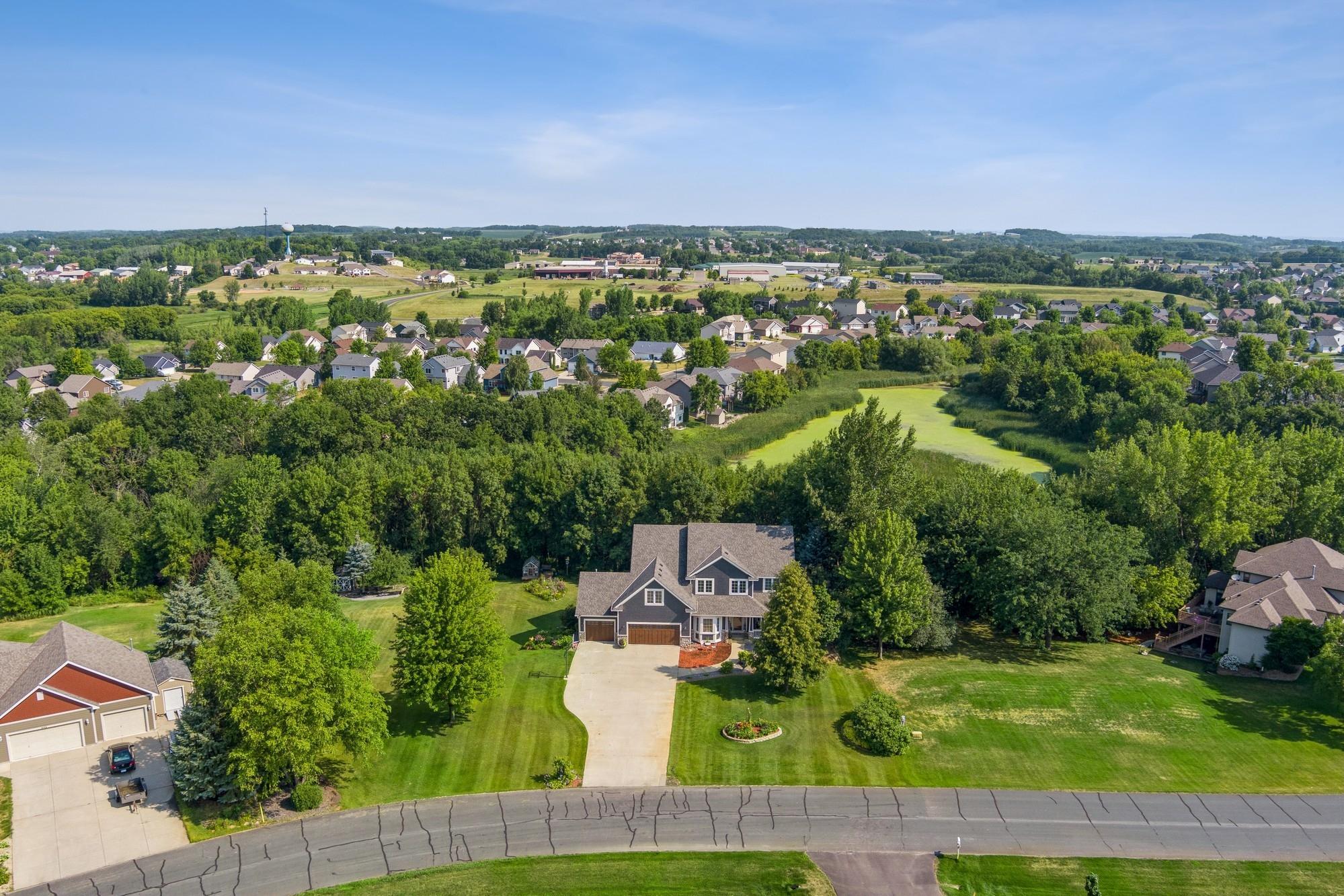 Set on 2.2 private acres, the property offers a peaceful natural setting with winding walking trails perfect for bird watching, quiet morning strolls, or simply enjoying the outdoors.