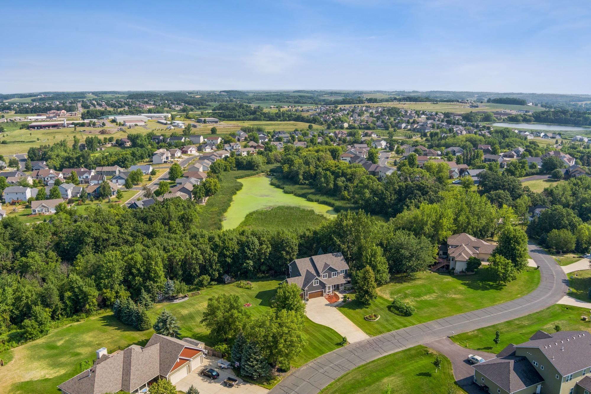 This 2.2-acre property offers a park-like setting