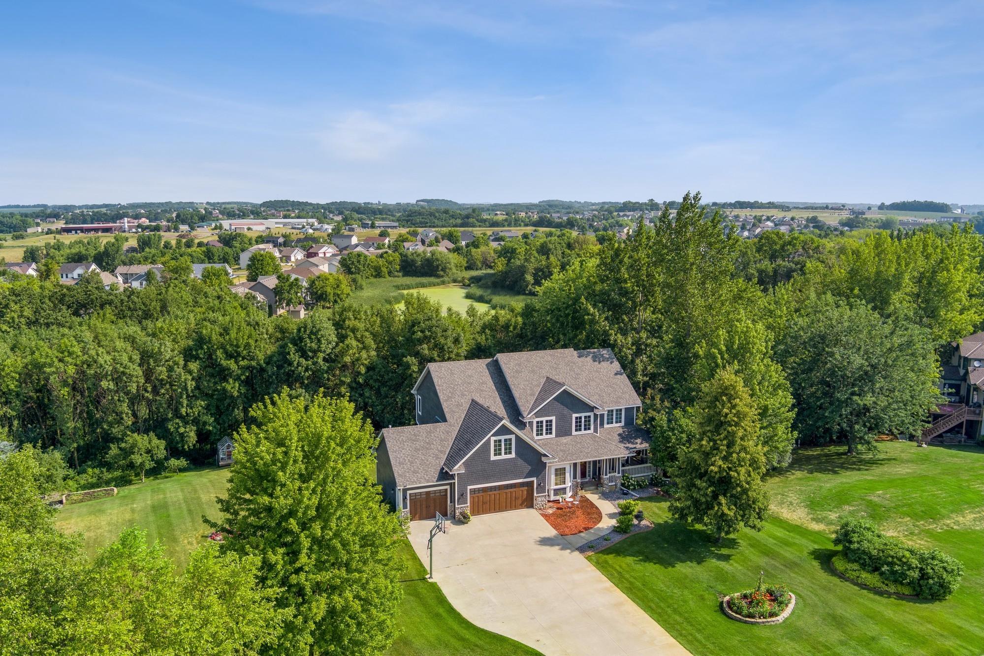 Extended concrete driveway offering exceptional parking capacity and easy access, ideal for entertaining, storing recreational vehicles, or accommodating multiple drivers.