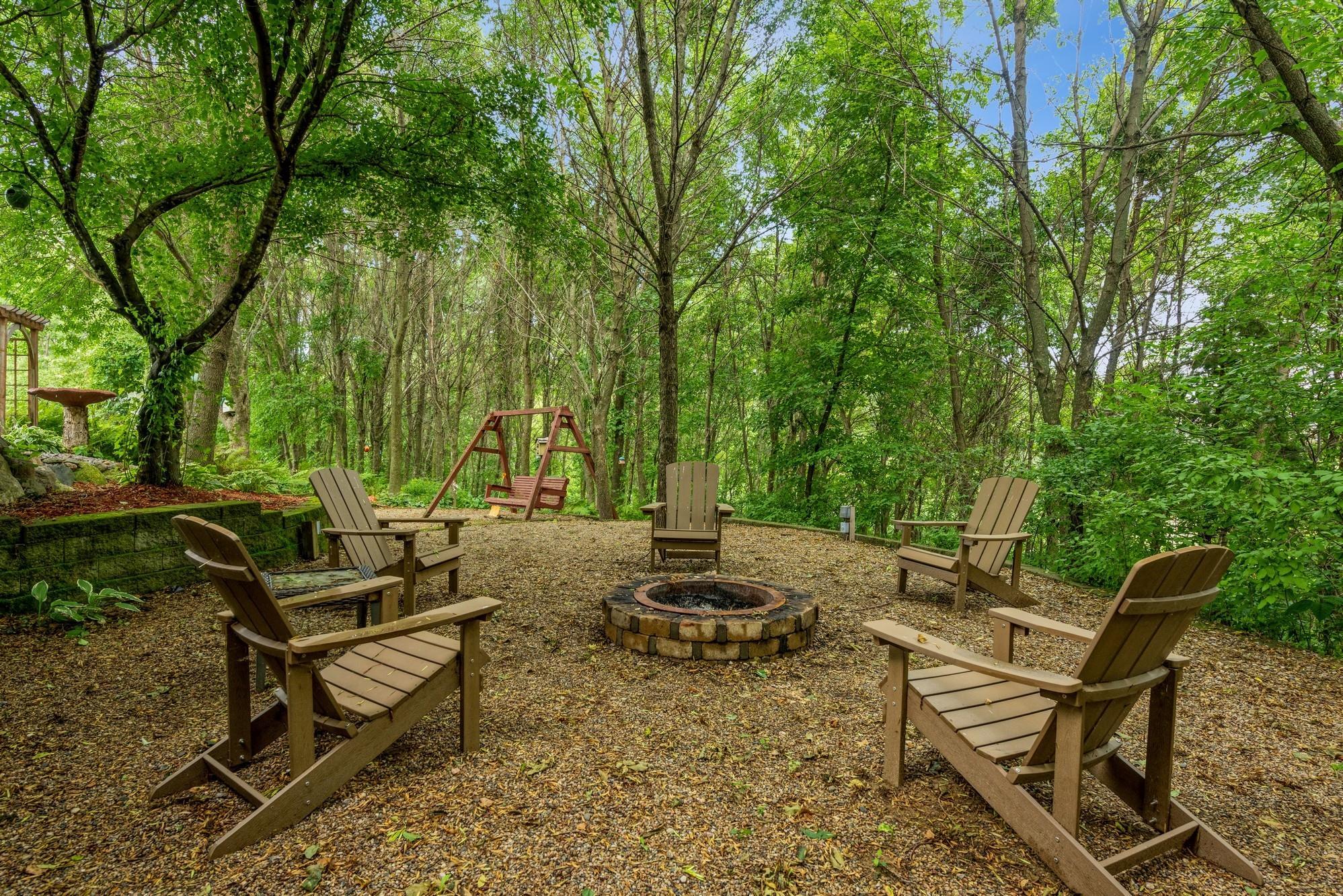 A private fire pit area creates the ideal spot for relaxing evenings under the stars.