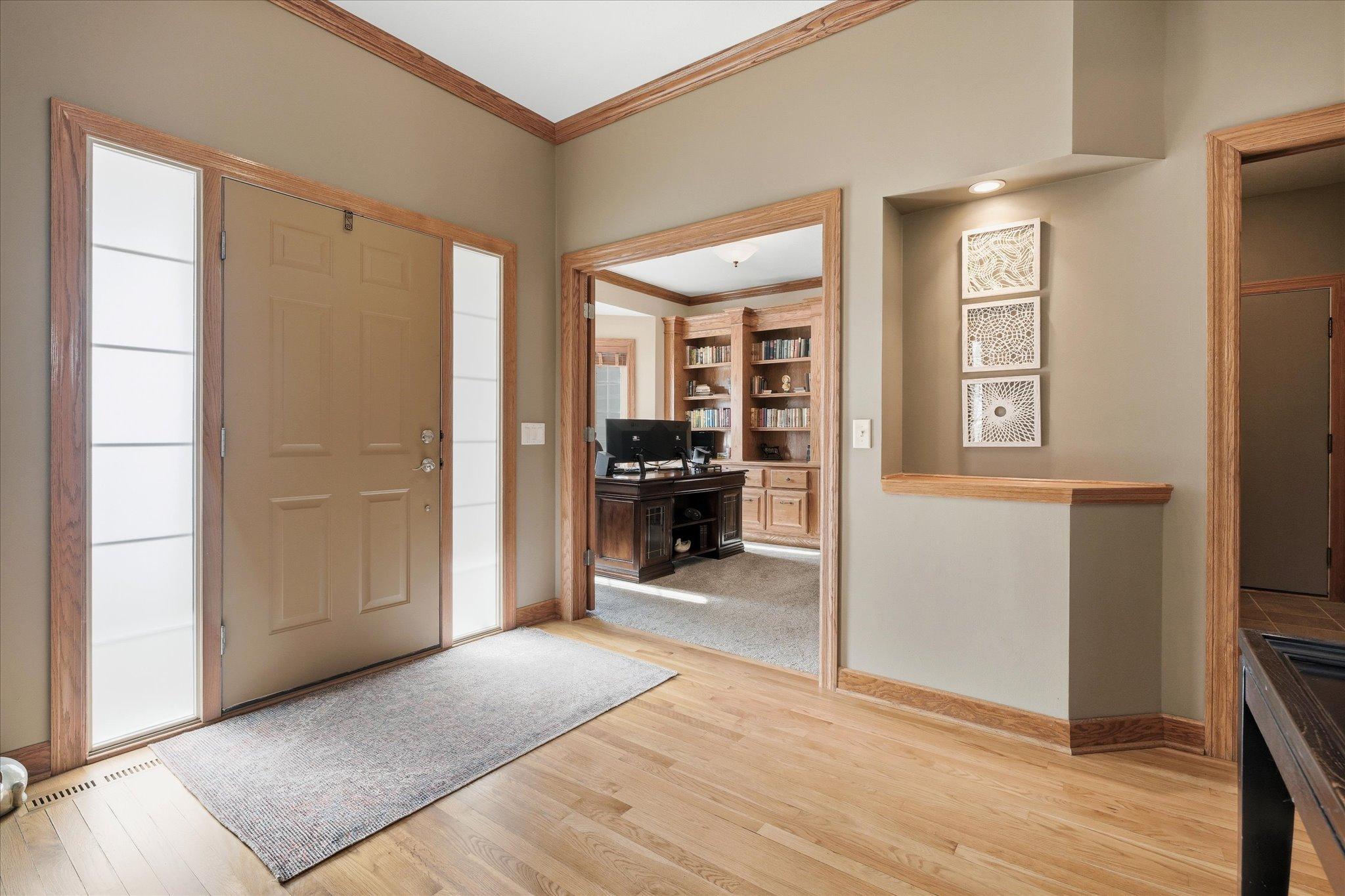 Welcoming foyer that sets the tone for the home, offering a bright and inviting entry space that creates a warm first impression for guests.