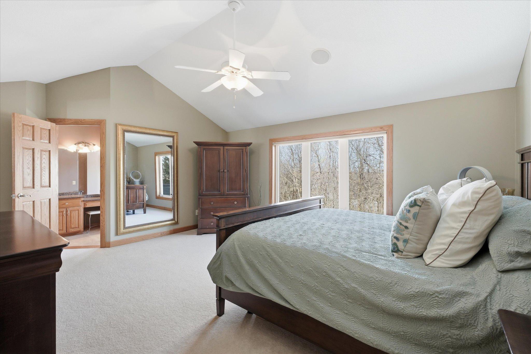 Spacious primary suite with a private full bath featuring a separate soaking tub and expansive walk-in shower. Large walk-in closet and a flexible bonus room that has served as an office, nursery, or additional closet space.