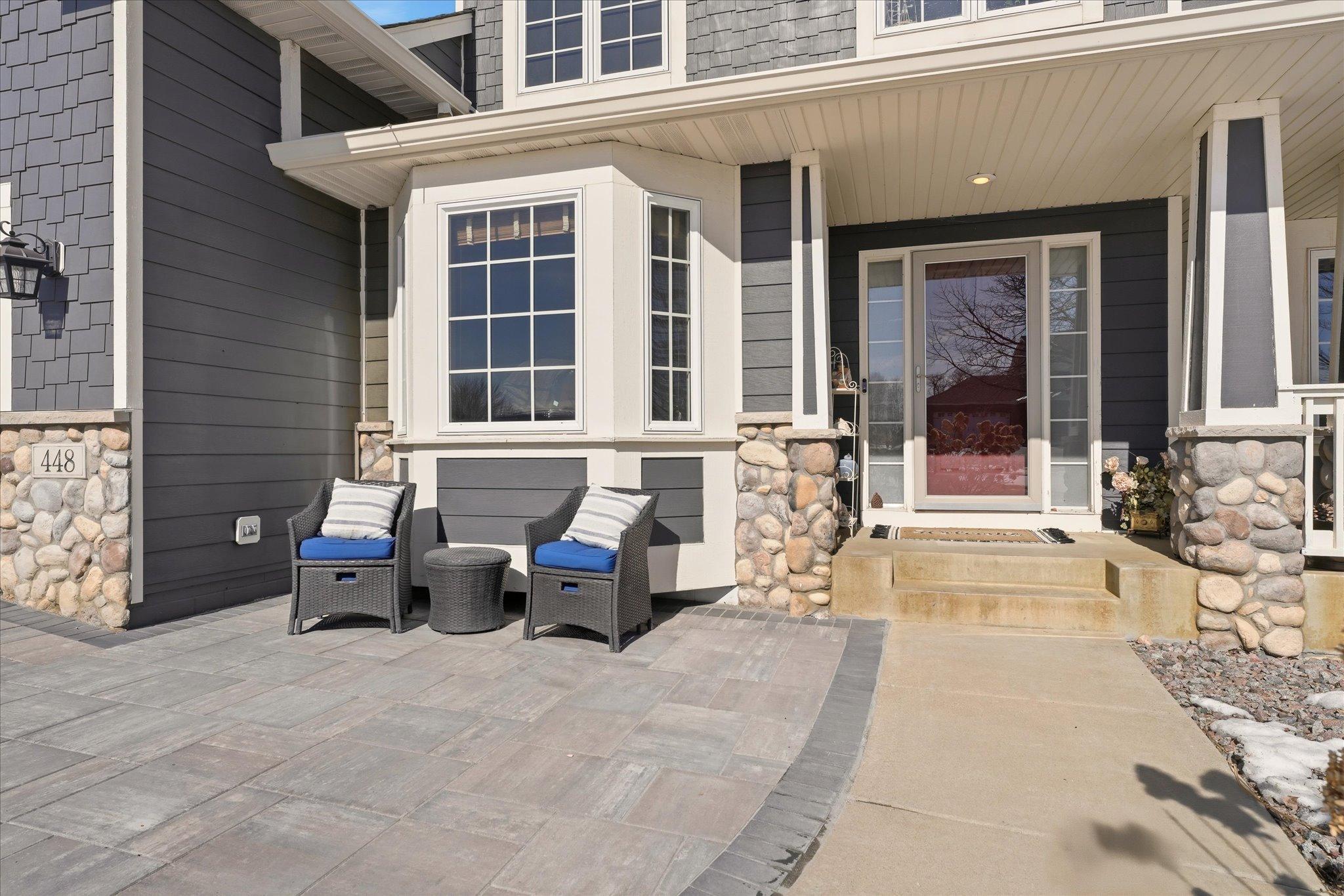 Recently added paver patio offering a stylish and low-maintenance outdoor retreat.