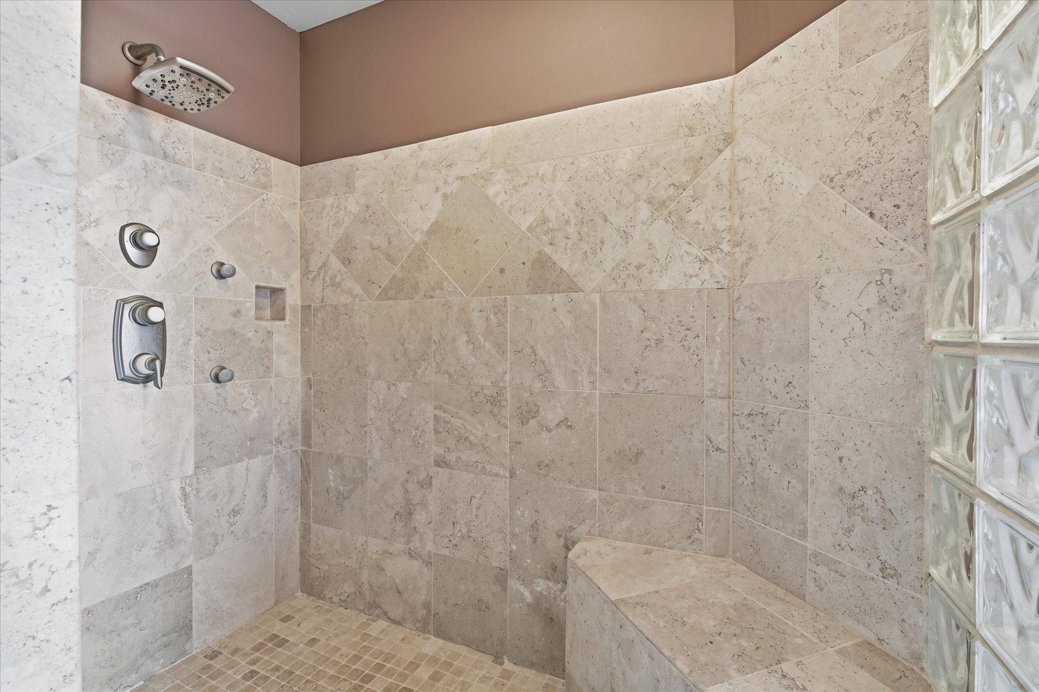 Oversized walk-in shower.