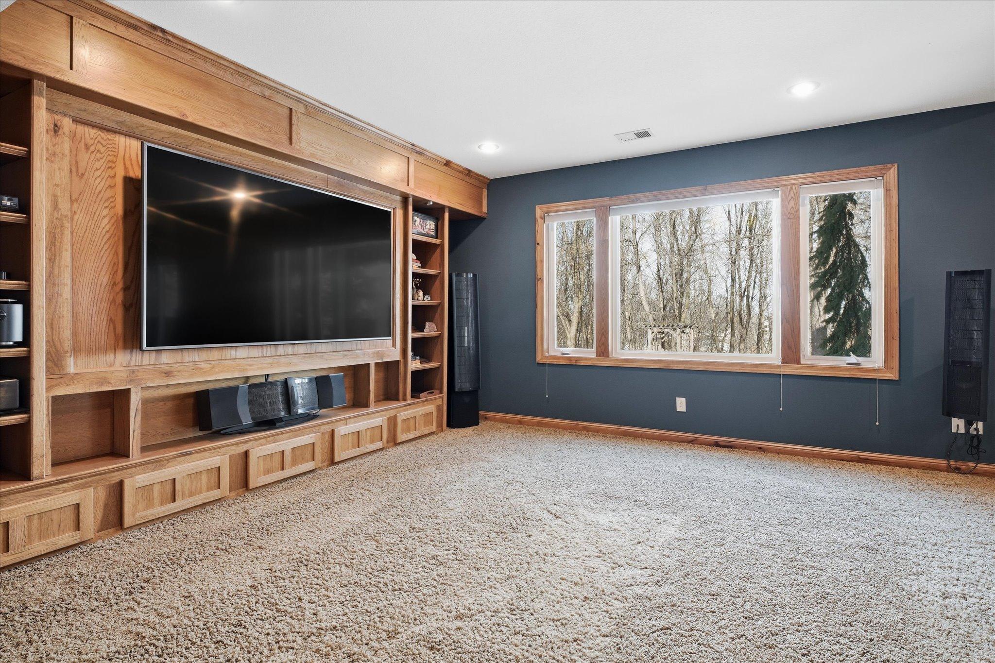 immersive space perfect for movie nights, gaming, or relaxing with family and friends.