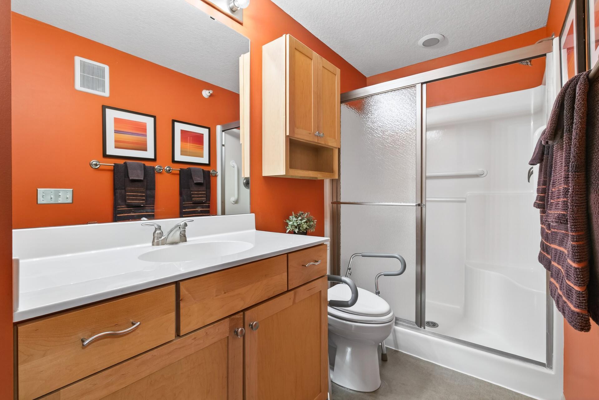 Step-in shower. Floating vanity with under cabinet lighting