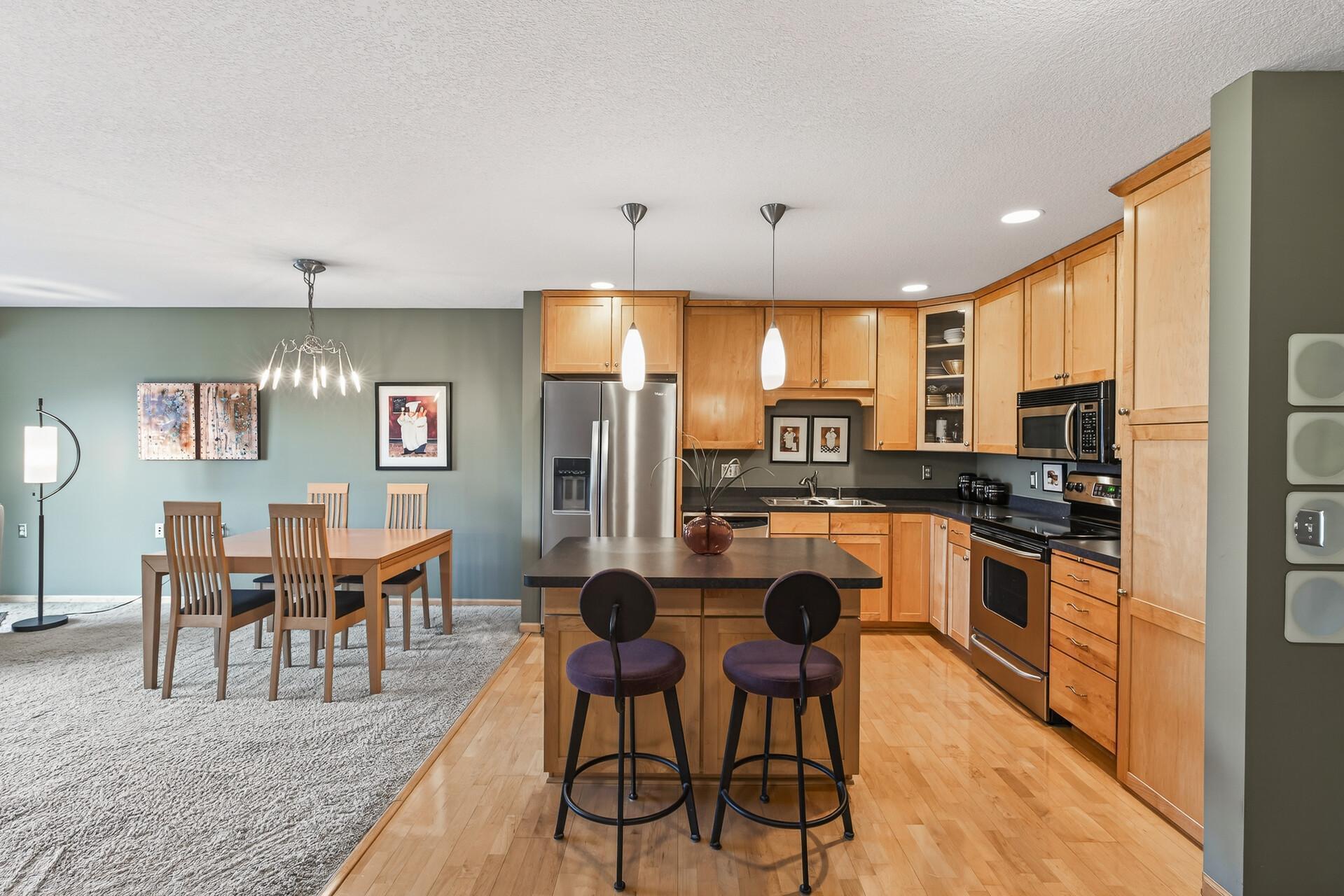 Open concept with stainless steel appliances
