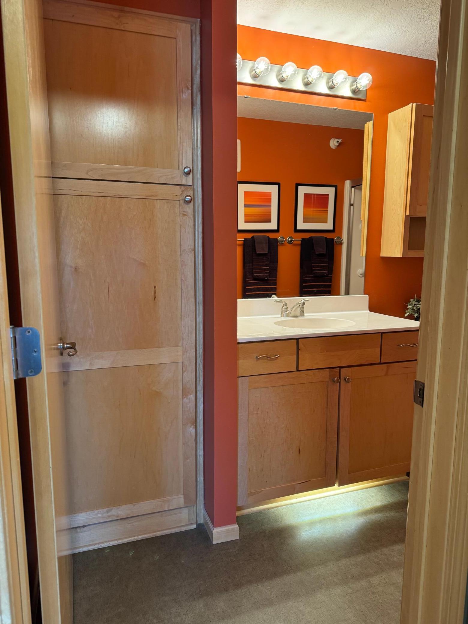 Large linen cabinet as you enter the bathroom