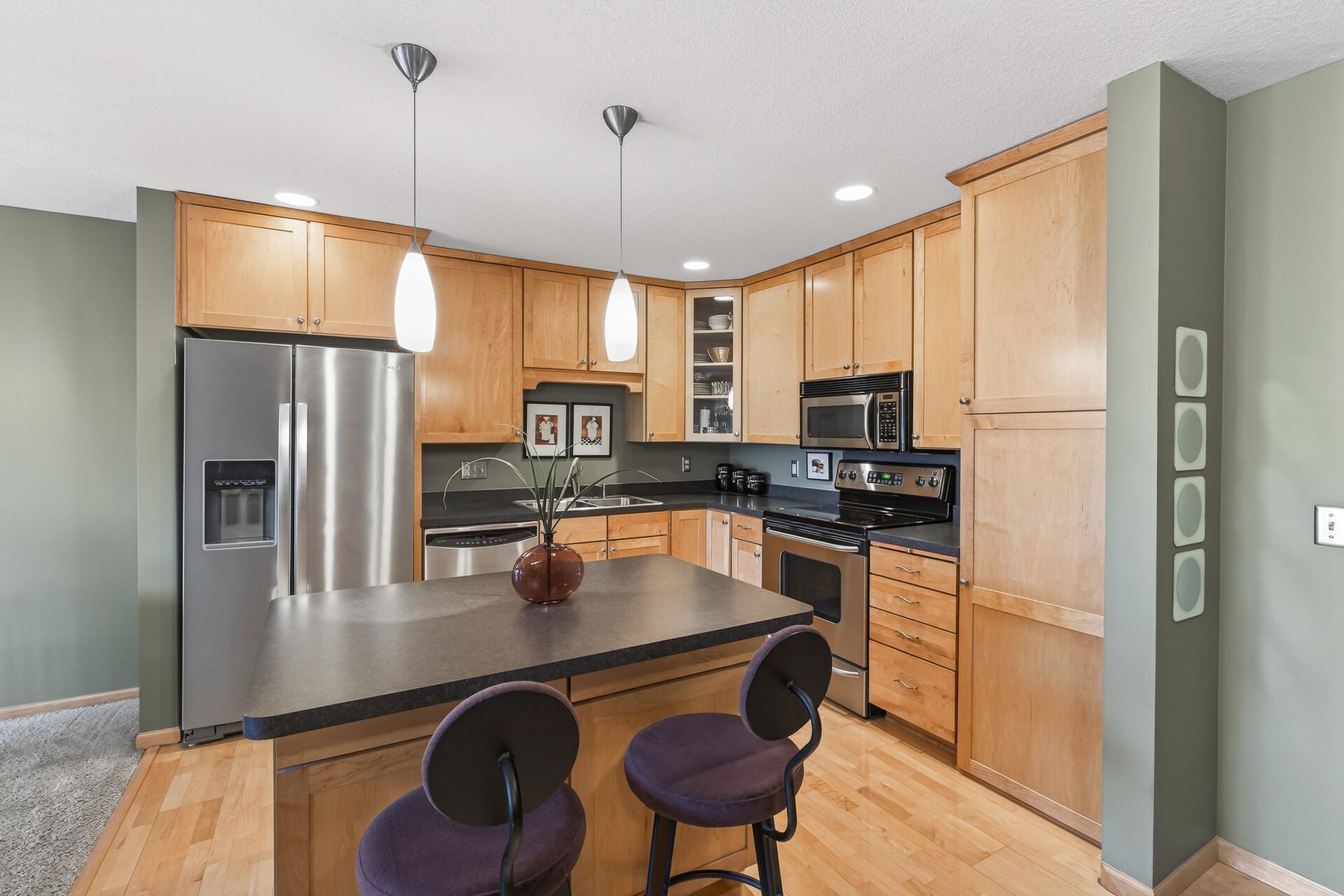 Ceiling-height shaker cabinets are rare in this community