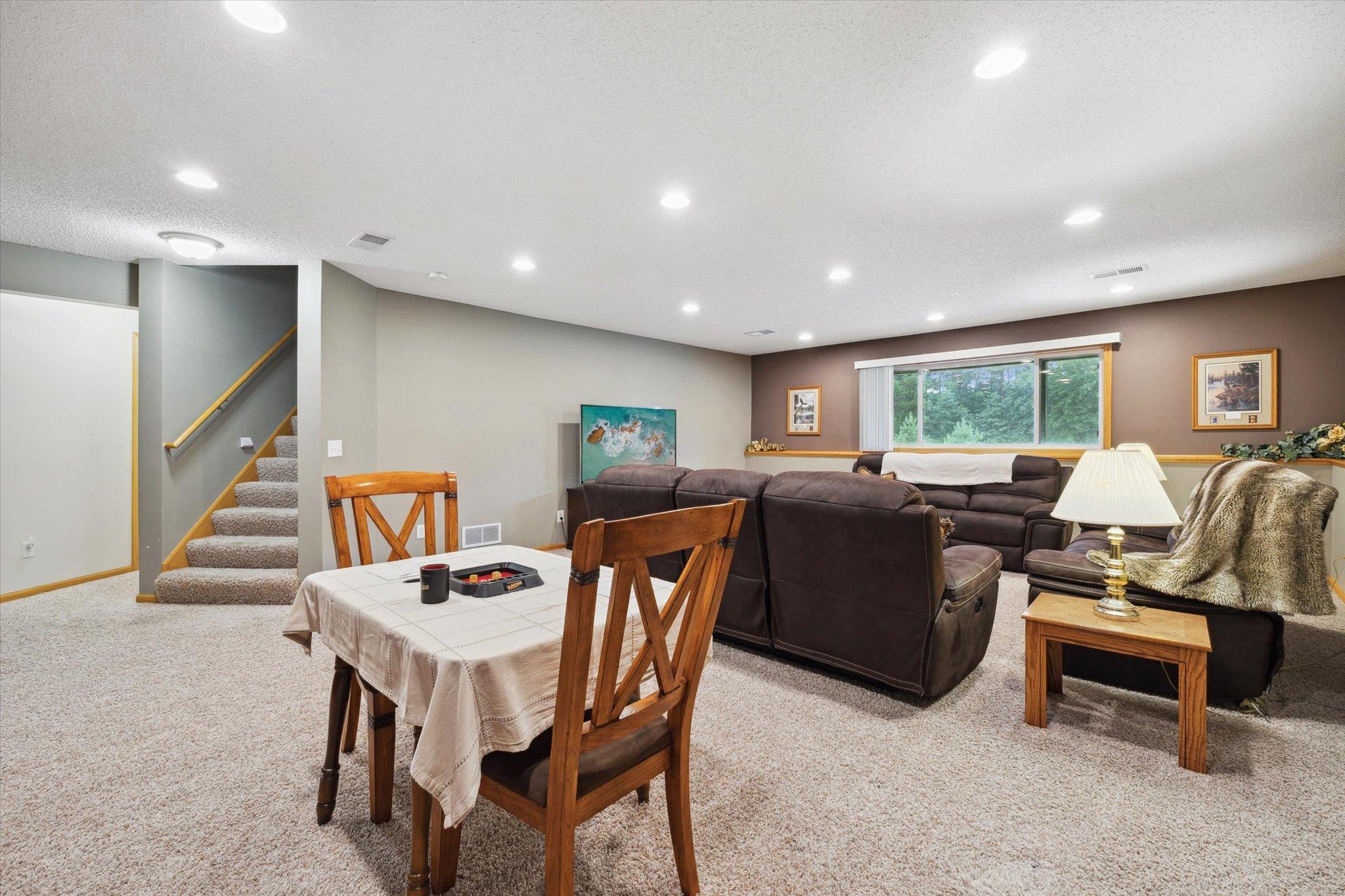 Lower level provides additional open recreation and family space with lookout windows for natural light.