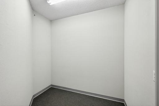 storage closet, located down the hall from unit