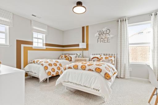 Secondary bedrooms are spacious with walk-in closets