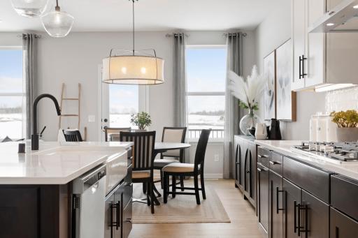 View from kitchen to cafe and door to future deck