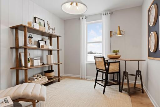 Main floor flex room perfect for an office/crafts/bedroom