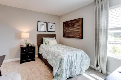 Bedroom 4. *Photos are of a previously staged model*