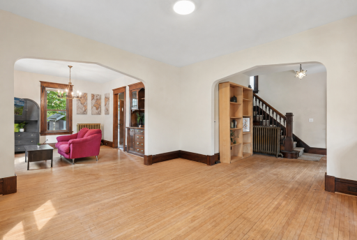 The open main floor includes an spacious living room, with a floor plan that offers thoughtfully designed spaces for everyday living and entertaining.