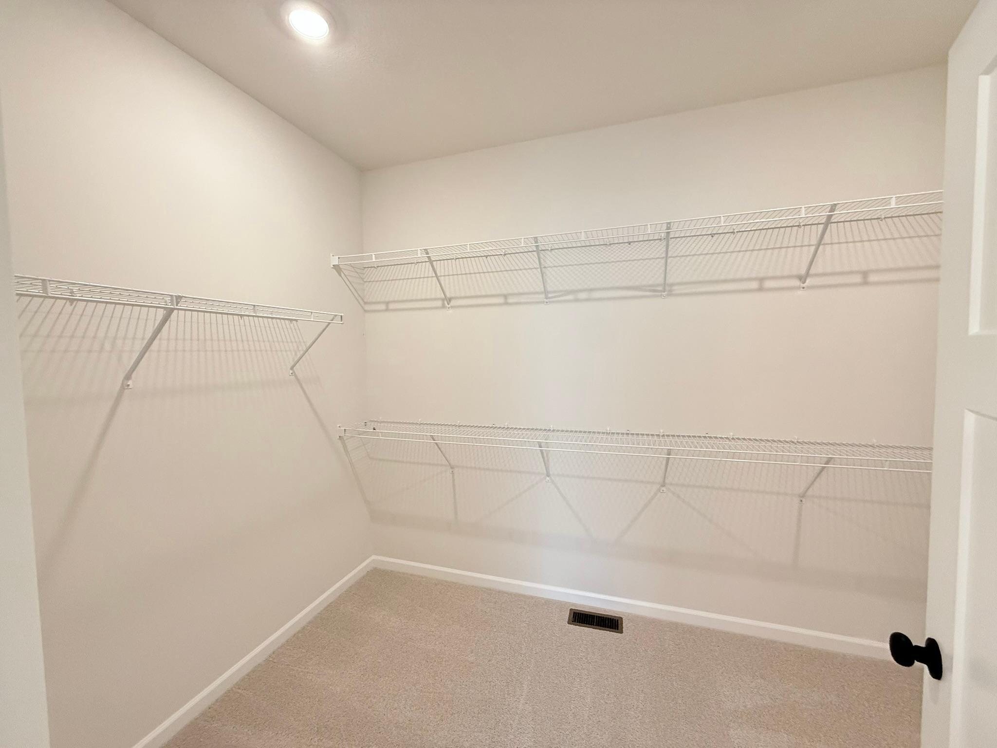 Huge owner's walk-in closet