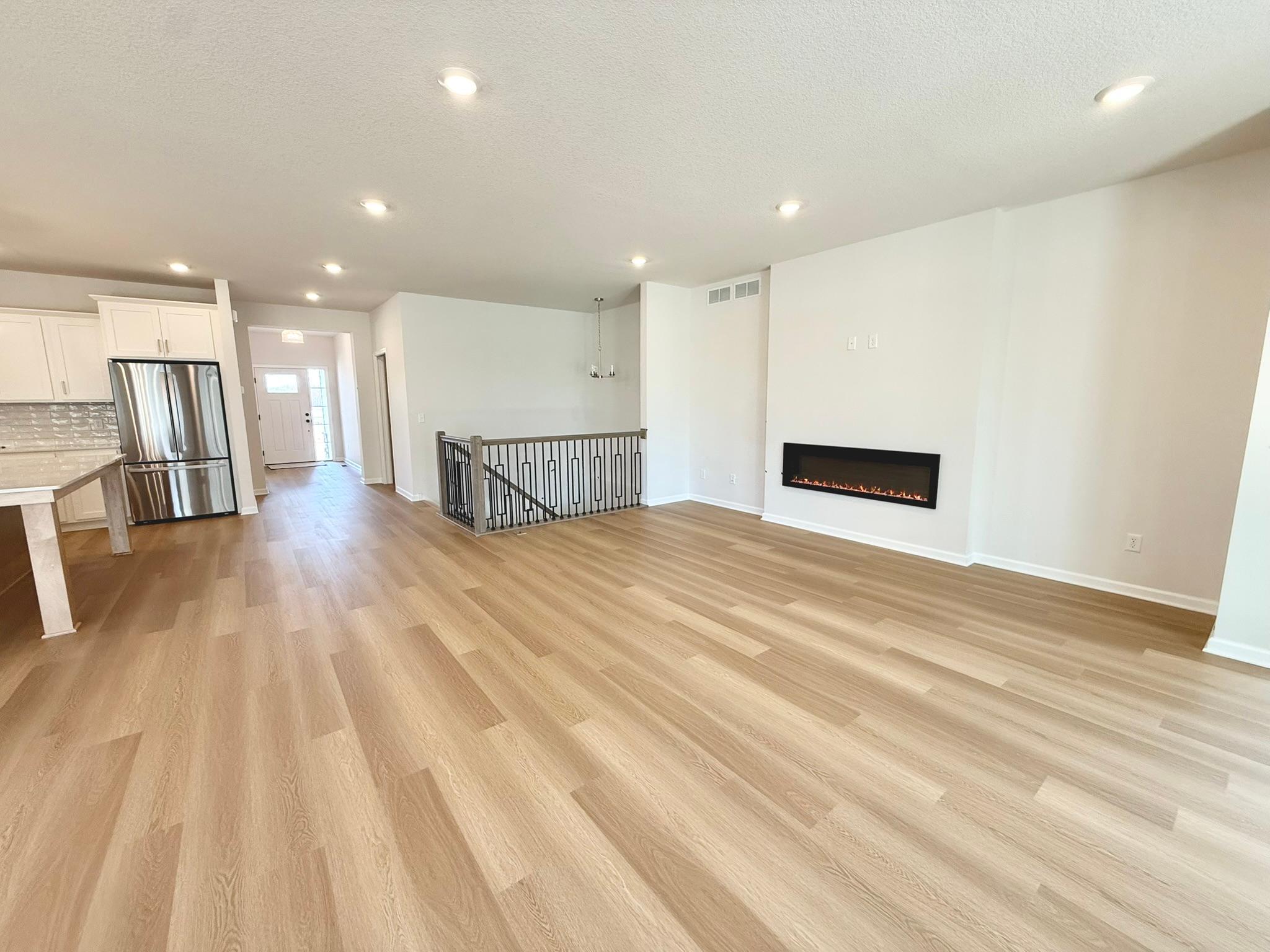 Large living area adjacent to kitchen